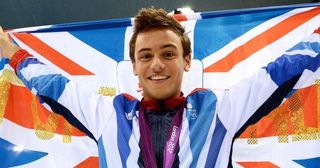 Tom Daley celebrates Bronze at the London 2012 Olympics.