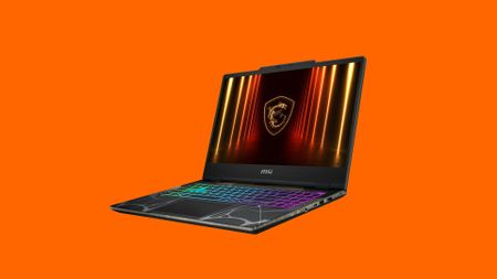 The MSI Cyborg laptop on an orange background.