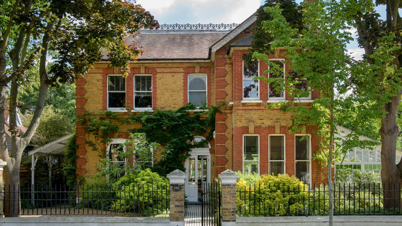 Victorian houses in London, built in 1860, with an extension and veranda-covered terrace added to the back in 1890