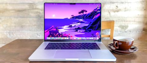 MacBook Pro 2021 (16-inch) review unit sitting on a coffee table