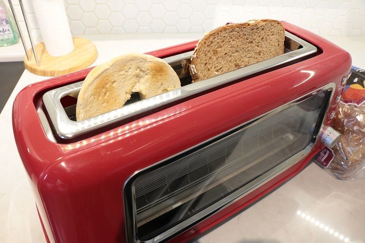 Dash Clear View image: This toaster does not have a high lift design, so you may have to reach in to pull out short pieces of bread.