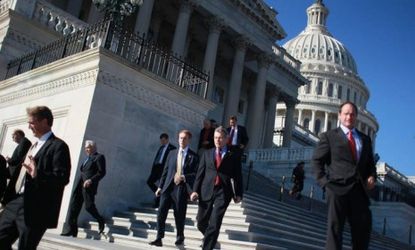 Members of Congress leave the U.S. Capitol: The median net worth of House members is $704,500 greater than that of their constituents.