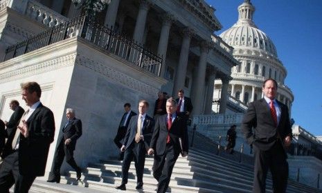 Members of Congress leave the U.S. Capitol: The median net worth of House members is $704,500 greater than that of their constituents.