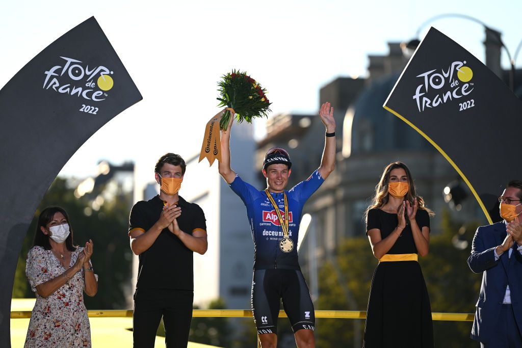 PARIS FRANCE JULY 24 Jasper Philipsen of Belgium and Team AlpecinFenix celebrates winning the stage on the podium ceremony after the 109th Tour de France 2022 Stage 21 a 1156km stage from Paris La Dfense to Paris Champslyses TDF2022 WorldTour on July 24 2022 in Paris France Photo by Dario BelingheriGetty Images