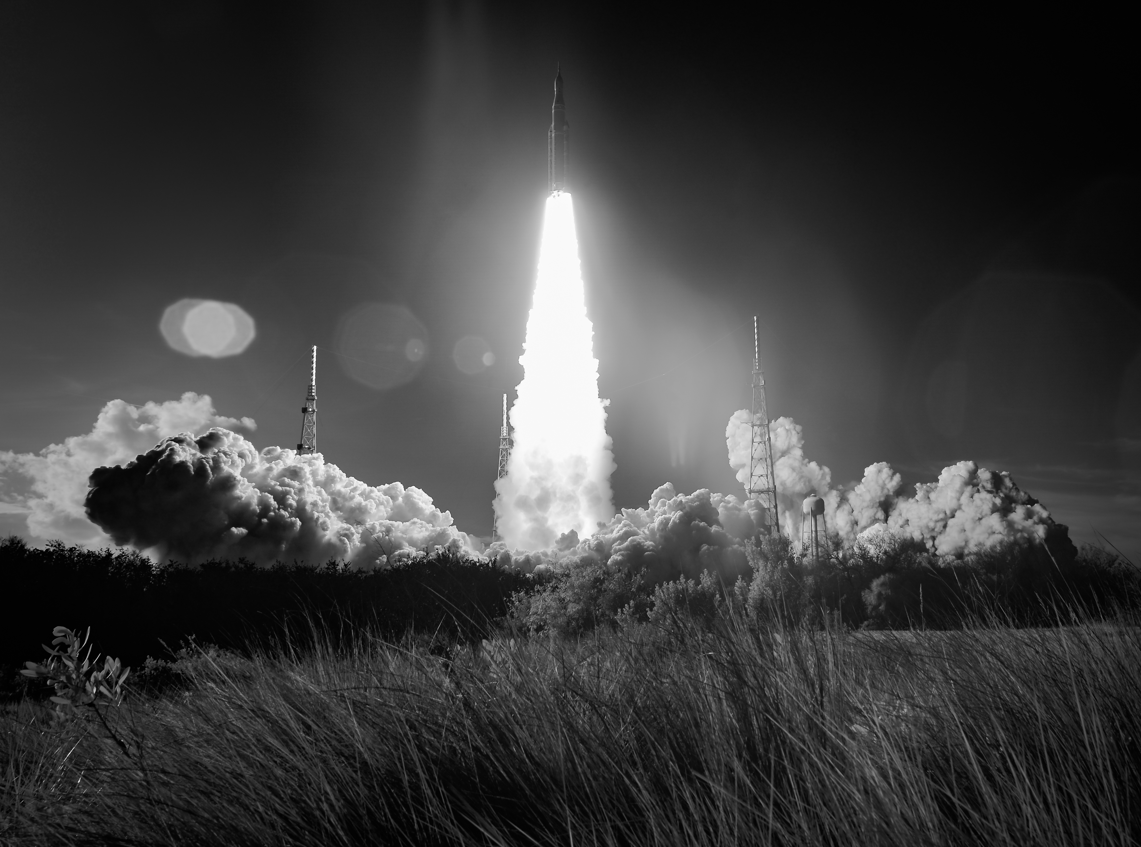 In this black and white infrared image, NASA’s Space Launch System rocket carrying the Orion spacecraft launches on the Artemis II mission, Wednesday, April 1, 2026