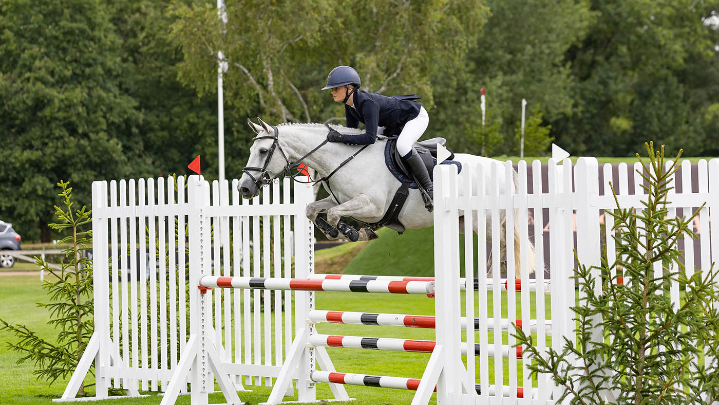 Gabriella Douglas jumps on oxer at the Hickstead Royal International Horse Show on Farravaune Shannen