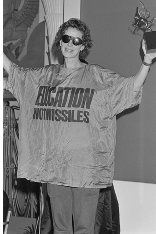 1980s Fashion: Katharine Hamnett wearing a political t shirt advocating for education