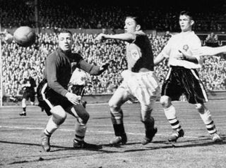 Stan Mortensen scores for Blackpool against Bolton Wanderers in the 1953 FA Cup final