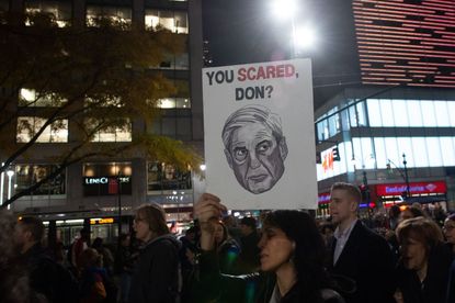 Protesters call for Robert Mueller's investigation to be protected