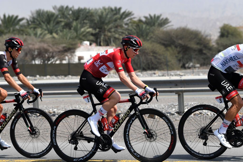 AL MARJAN UNITED ARAB EMIRATES FEBRUARY 24 Tadej Pogacar of Slovenia and UAE Team Emirates red leader jersey competes during the 4th UAE Tour 2022 Stage 5 a 182km stage from Ras al Khaimah Corniche to Al Marjan Island UAETour WorldTour on February 24 2022 in Al Marjan United Arab Emirates Photo by Tim de WaeleGetty Images