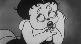 A screenshot of Betty Boop singing in the 1930 animated short, "Dizzy Dishes."