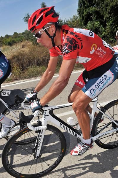 Philippe Gilbert (Omega Pharma - Lotto) in the red leader's jersey.
