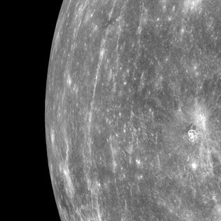 A view of the horizon of Mercury, taken by NASA's Messenger spacecraft on March 29, 2011. The picture shows a stretch of land about 750 miles long, from top to bottom.