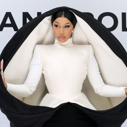 cardi b wearing a black and white sculptural dress