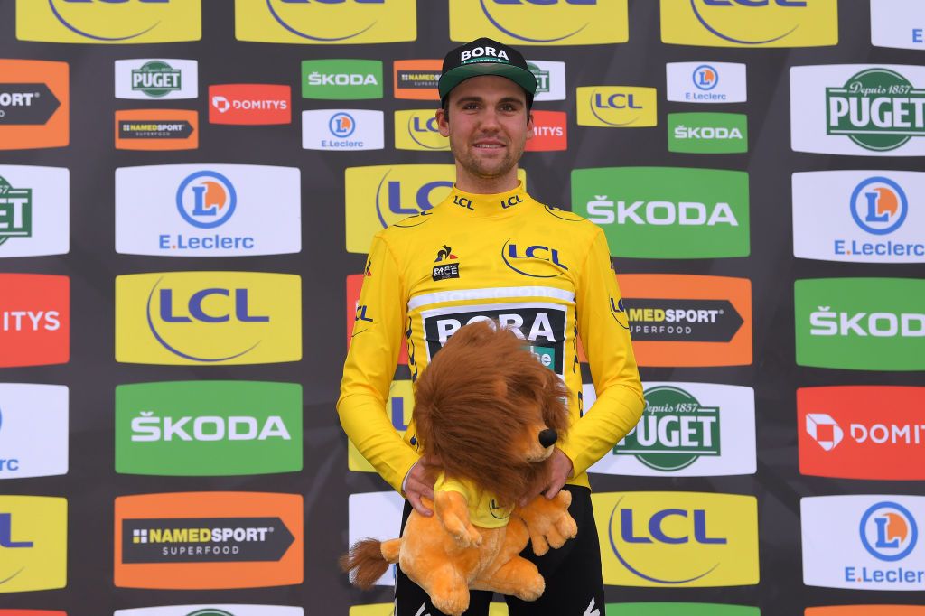 LA CHATRE FRANCE MARCH 10 Podium Maximilian Schachmann of Germany and Team Bora Hansgrohe Yellow Leader Jersey Celebration Lion Mascot during the 78th Paris Nice 2020 Stage 3 a 2125km stage from ChalettesurLoing to La Chtre ParisNice parisnicecourse PN on March 10 2020 in La Chatre France Photo by Luc ClaessenGetty Images