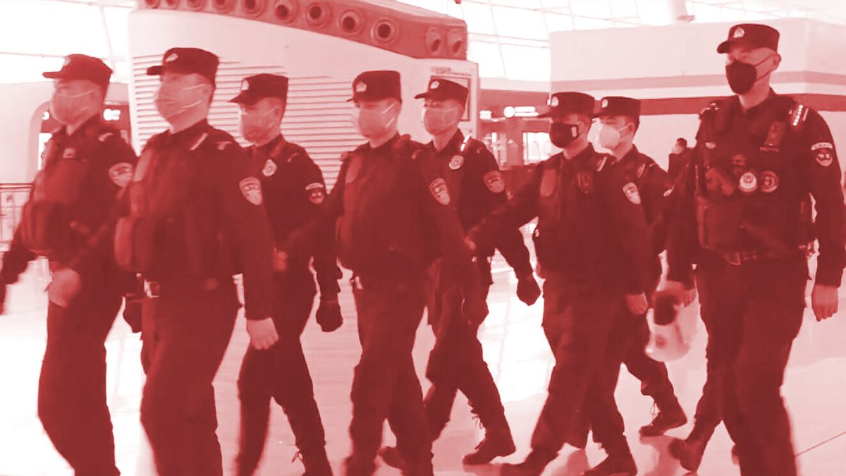 Policemen wearing masks as they patrol Wuhan Tianhe Airport during Wuhan coronavirus outbreak.