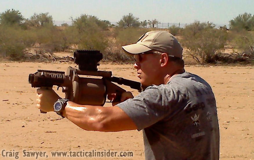 Firing a Milkor Multiple Grenade Launcher
