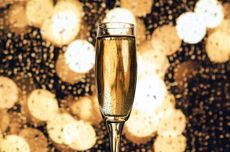 Black Friday Champagne deals; glass of Champagne