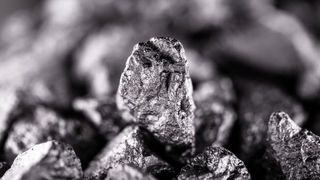 a pile of silvery niobium, a rare earth element 