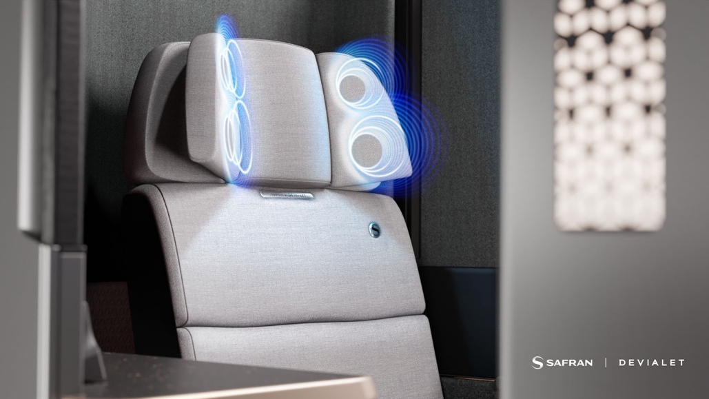 Devialet and Safran's Euphony flight seat in grey with illuminated speakers in the head-rest