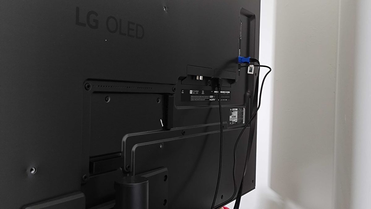 Back view of LG OLED G4 with cables connected