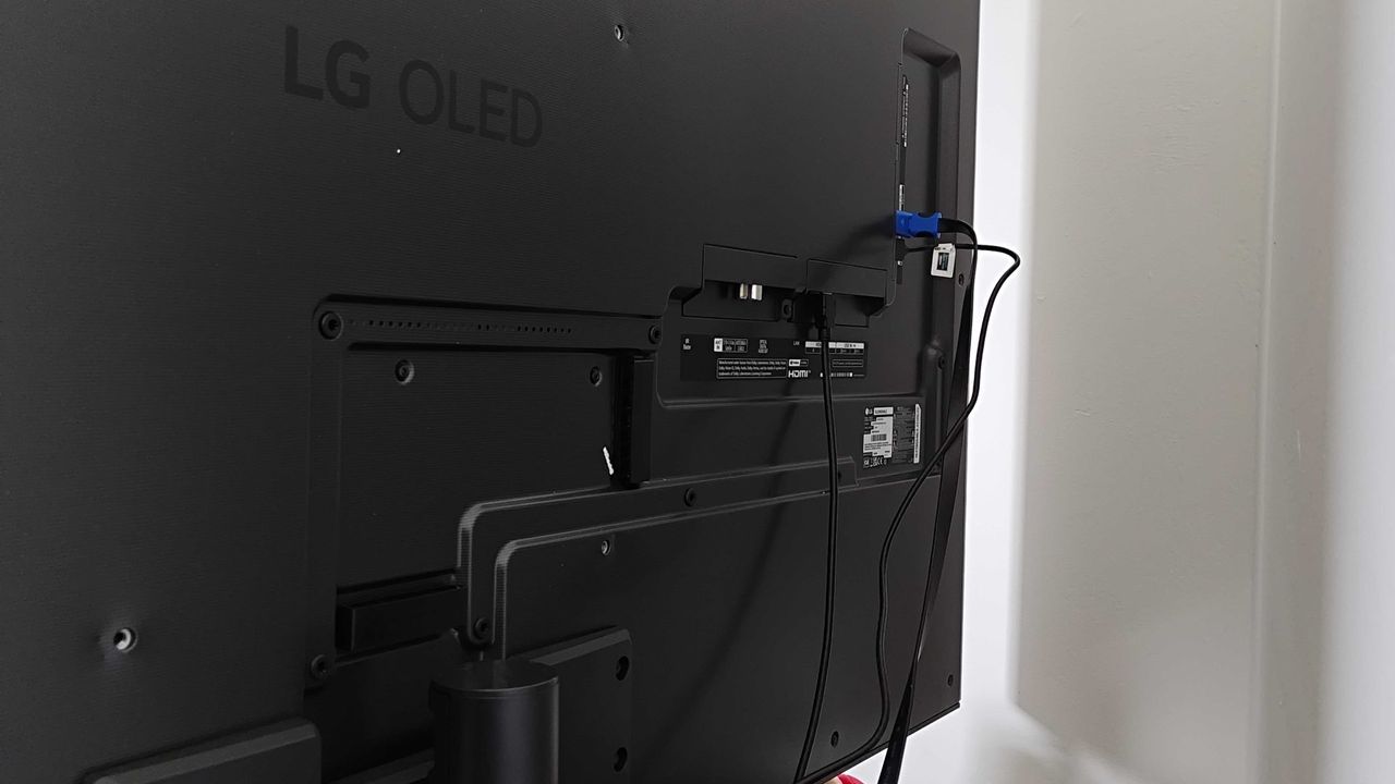 Back view of LG OLED G4 with cables connected
