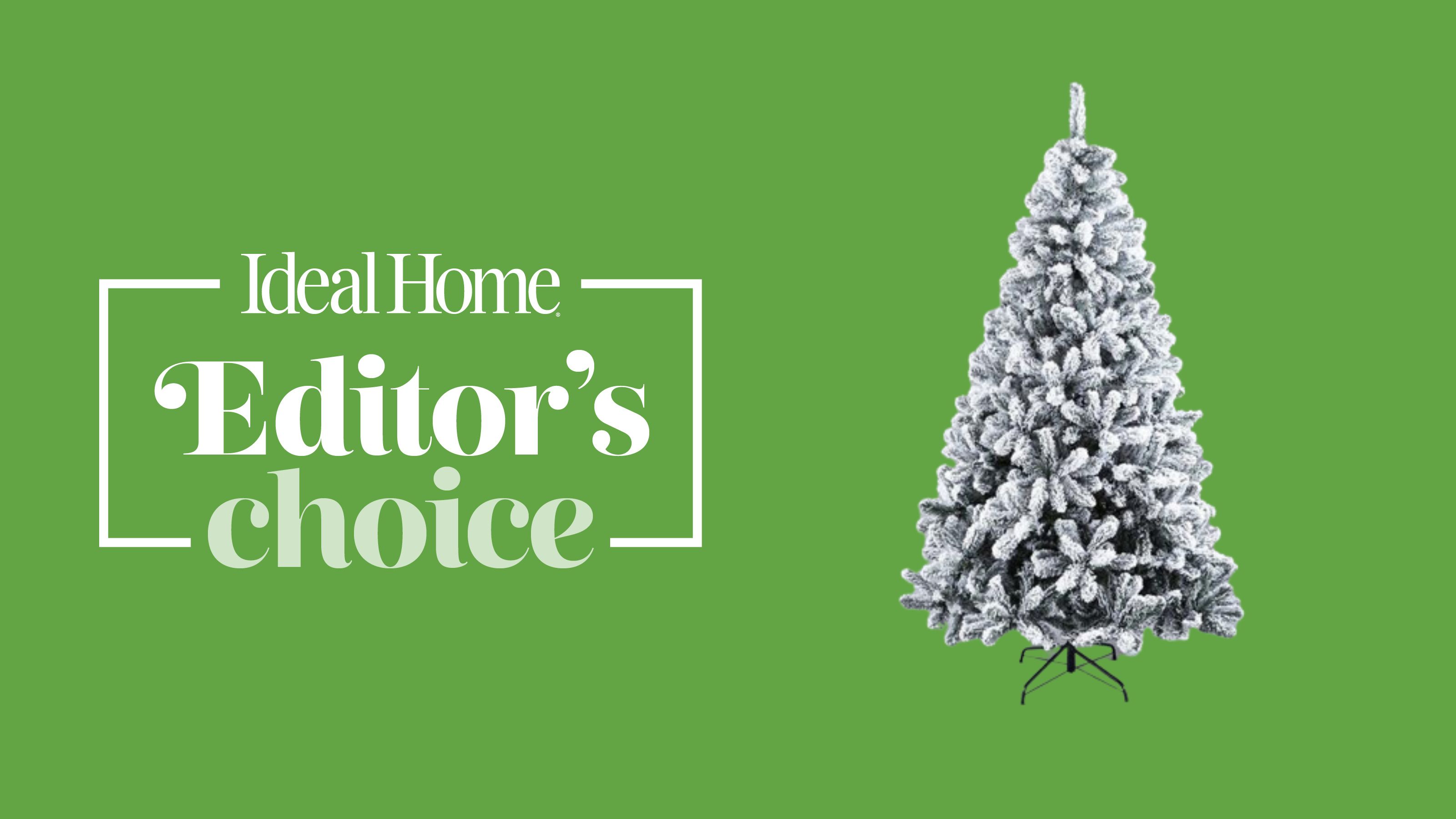 Flocked artificial Christmas tree on green background