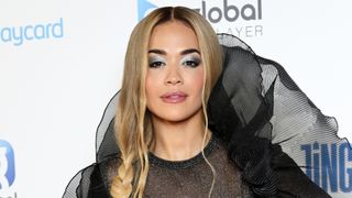Rita Ora is pictured with blonde hair and dark brown roots whilst attending Capital's Jingle Bell Ball 2023 at The O2 Arena on December 10, 2023 in London, England.