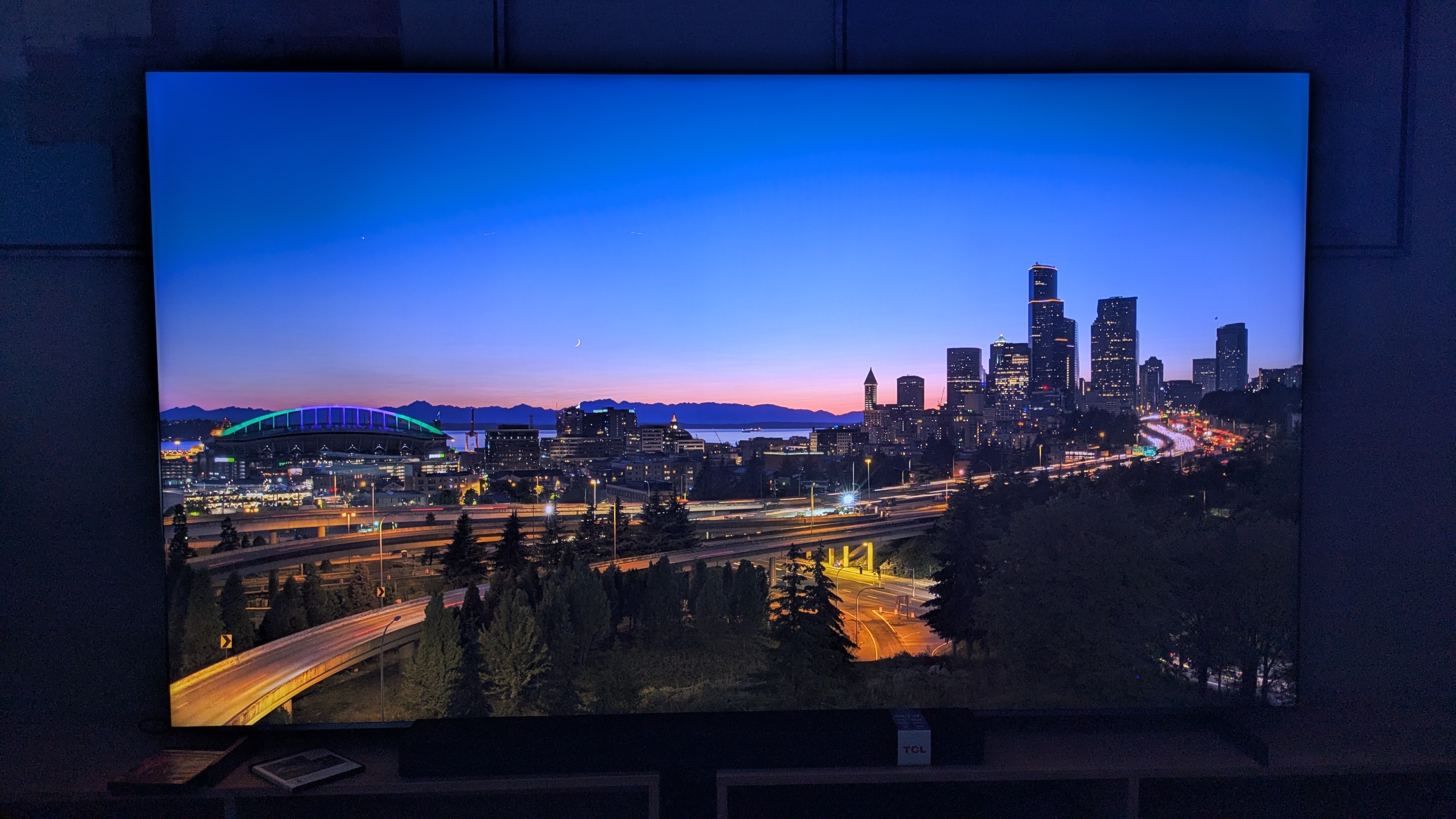 TCL 98-inch C8K with night landscape on screen