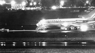 The hijacked Northwest Airlines jetliner 727 sits on a runway for refueling at Tacoma International Airport in Seattle, Washington on Nov. 25, 1971