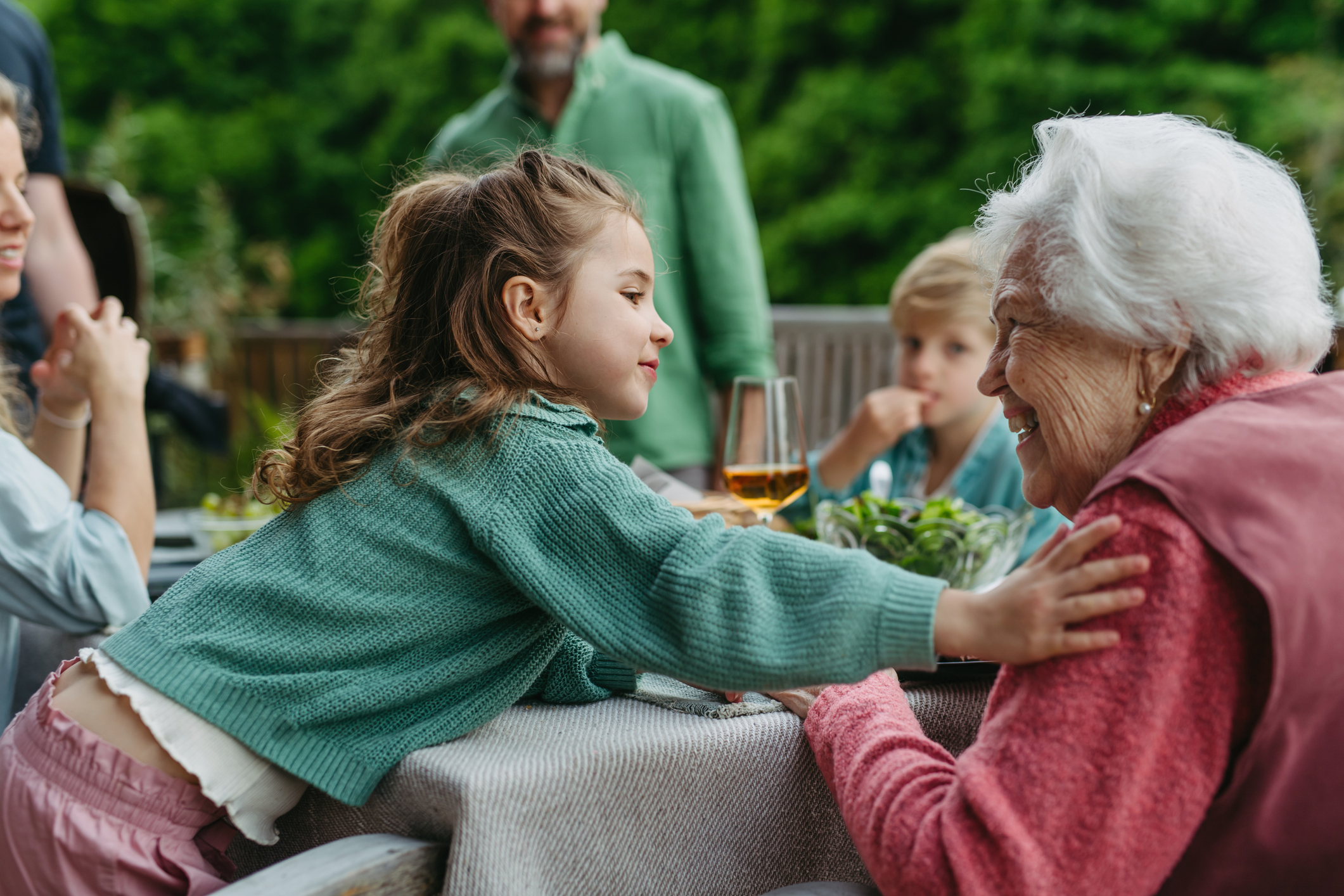 Family at lunch discussing inheritance
