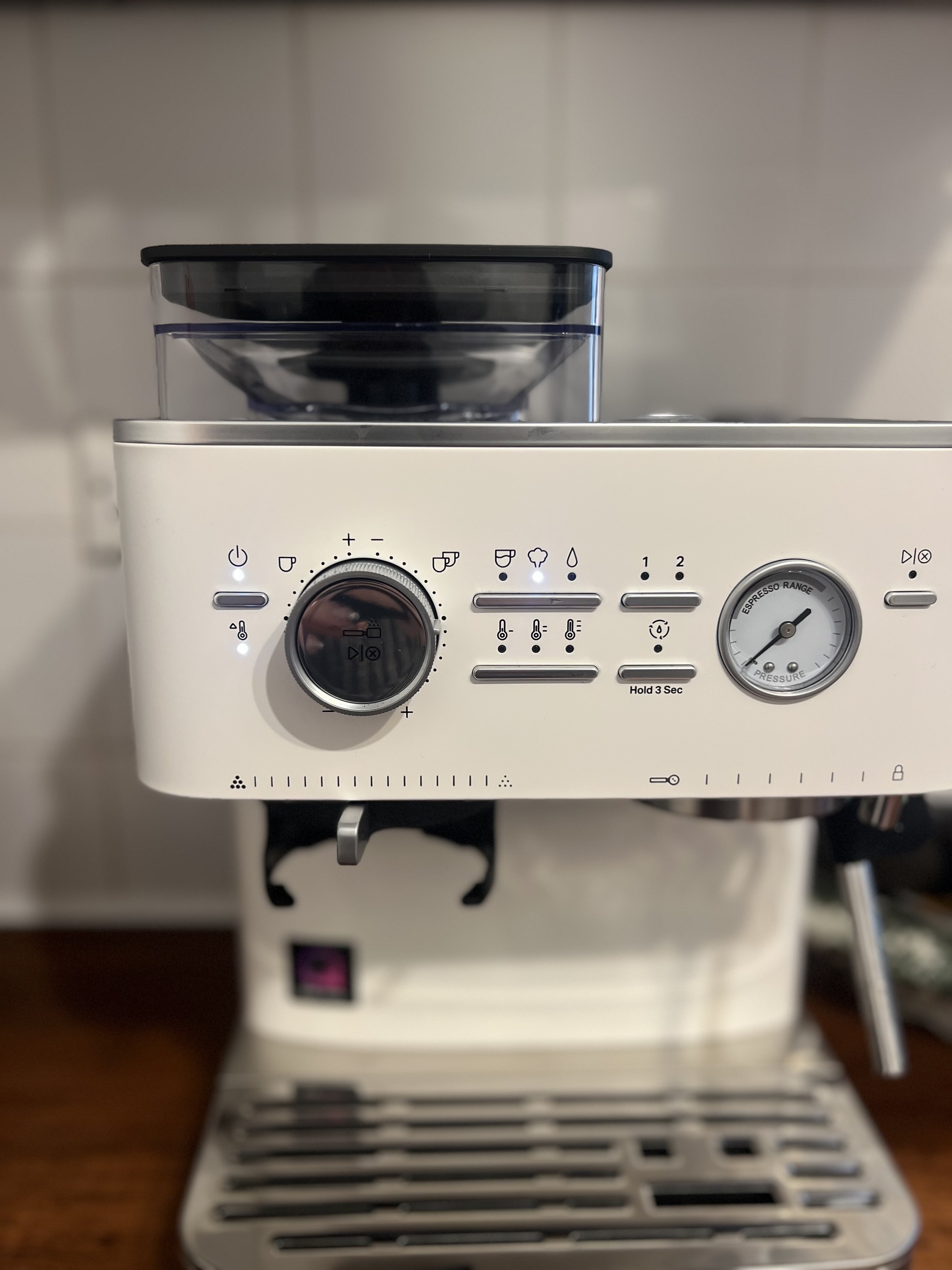 Close up image of a white KitchenAid Semi Automatic Coffee Machine