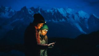 best weather apps: couple using one of our best weather apps for hiking