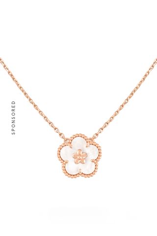 Van Cleef & Arpels Lucky Spring Pendant, Plum Blossom on a white background