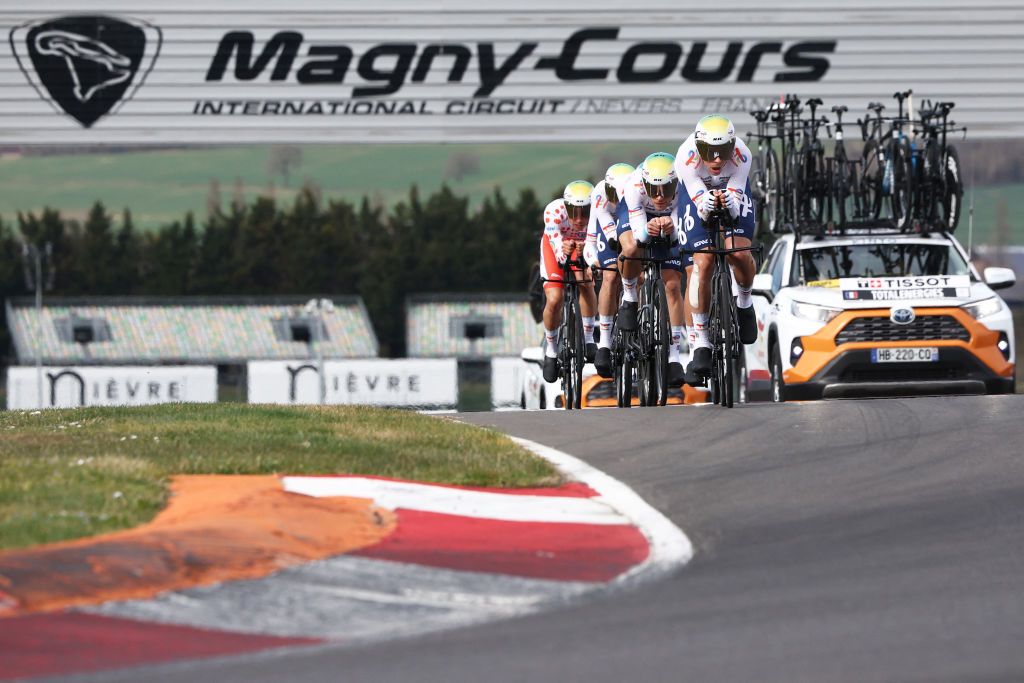 TotalEnergies' riders cycle during the 3rd stage of the Paris-Nice cycling race, a 28,4 km team time trial between Nevers Magny-Cours Circuit and Nevers, on March 11, 2025. (Photo by Anne-Christine POUJOULAT / AFP)