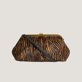 M&S x Sienna Miller Animal-Print Leather Clutch Bag cut out 