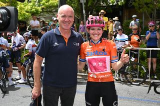 STIRLING AUSTRALIA JANUARY 19 LR Stuart OGrady OAM of Australia Santos Tour Down Under Race Director and overall race winner Noemi Ruegg of Switzerland and Team EF EducationOatly Orange Santos Leaders Jersey after the 9th Santos Womens Tour Down Under 2025 Stage 3 a 1059km stage from Stirling to Stirling 444m UCIWWT on January 19 2025 in Stirling Australia Photo by Dario BelingheriGetty Images