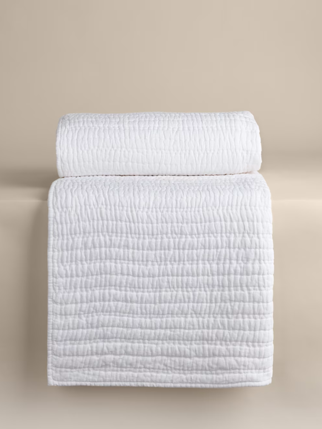 A dense textured quilted bedspread from M&amp;amp;S