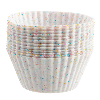 a stack of twelve silicone reusable cupcake cases in white with multicolored flecks like sprinkles