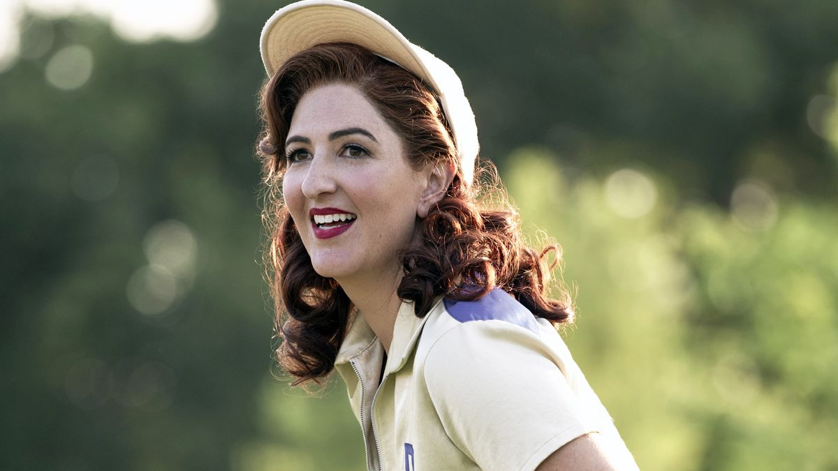 D&#039;Arcy Carden (Greta) smiles on the field in A League of Their Own