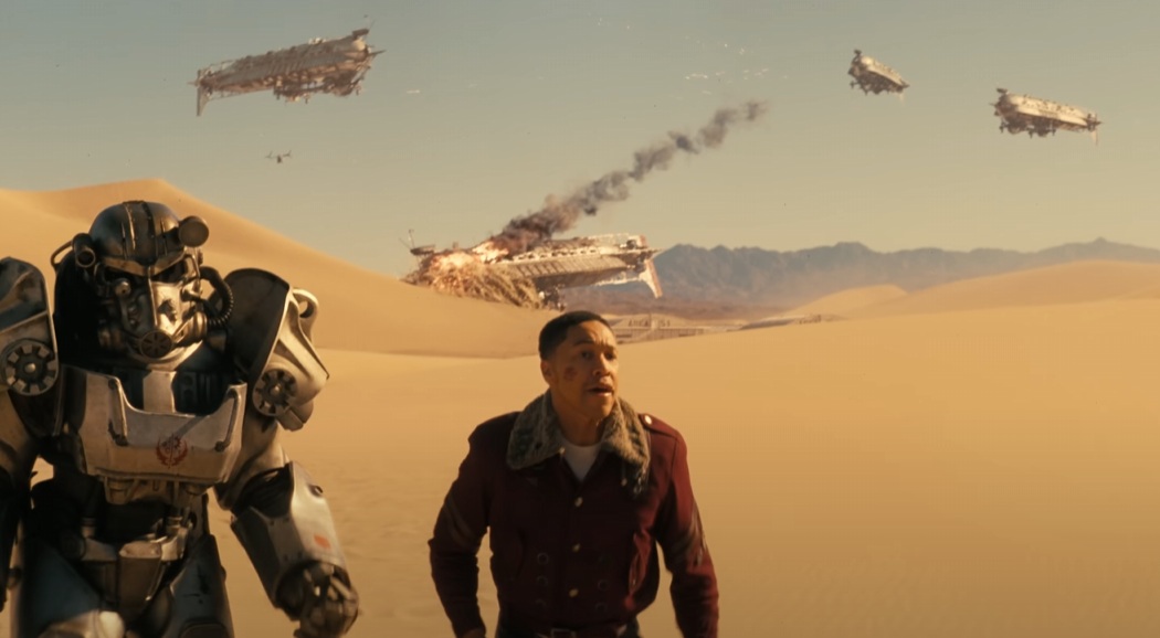 Maximus and a knight in power armor running with four airships in the background in the Fallout TV series Season 2