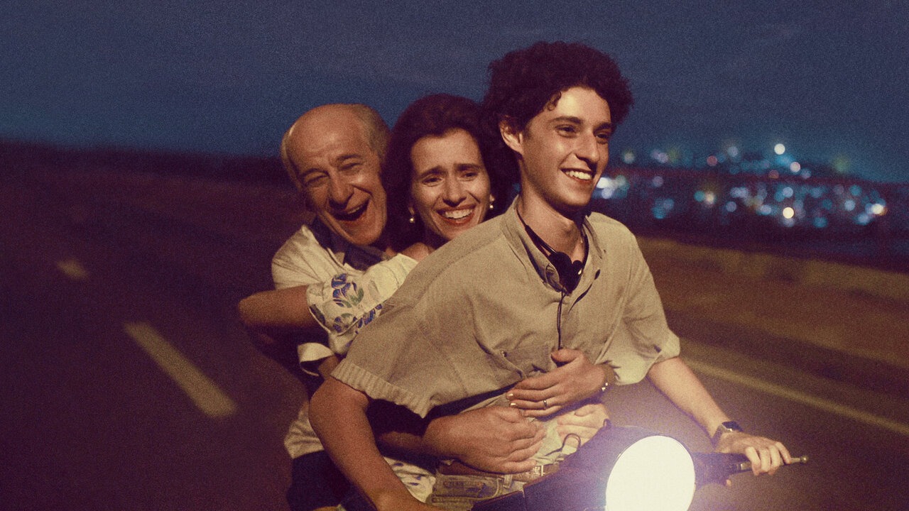 Still image of a family on a motorcycle in The Hand of God