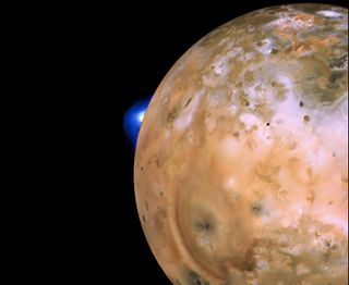 This image, captured by NASA's Voyager 1 spacecraft, shows a plume rising from Loki Patera, the largest volcano on the Jupiter moon Io.
