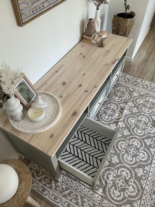 Above view of a customised IKEA HEMNES unit with geometric wallpapered draws