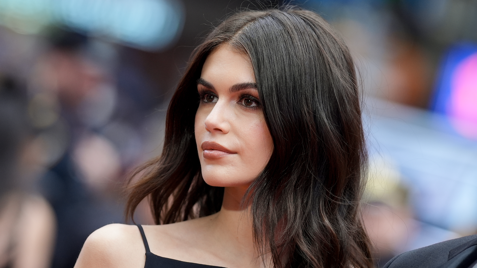 Kaia Gerber hosted a Library Science event in a halter LBD and brown ballet flats