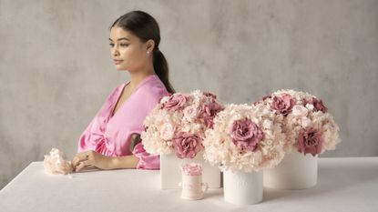 A woman with rose bouquets