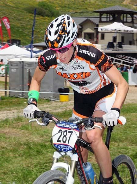 Lea Davison (Team Maxxis/Rocky Mountain) climbing out of the saddle