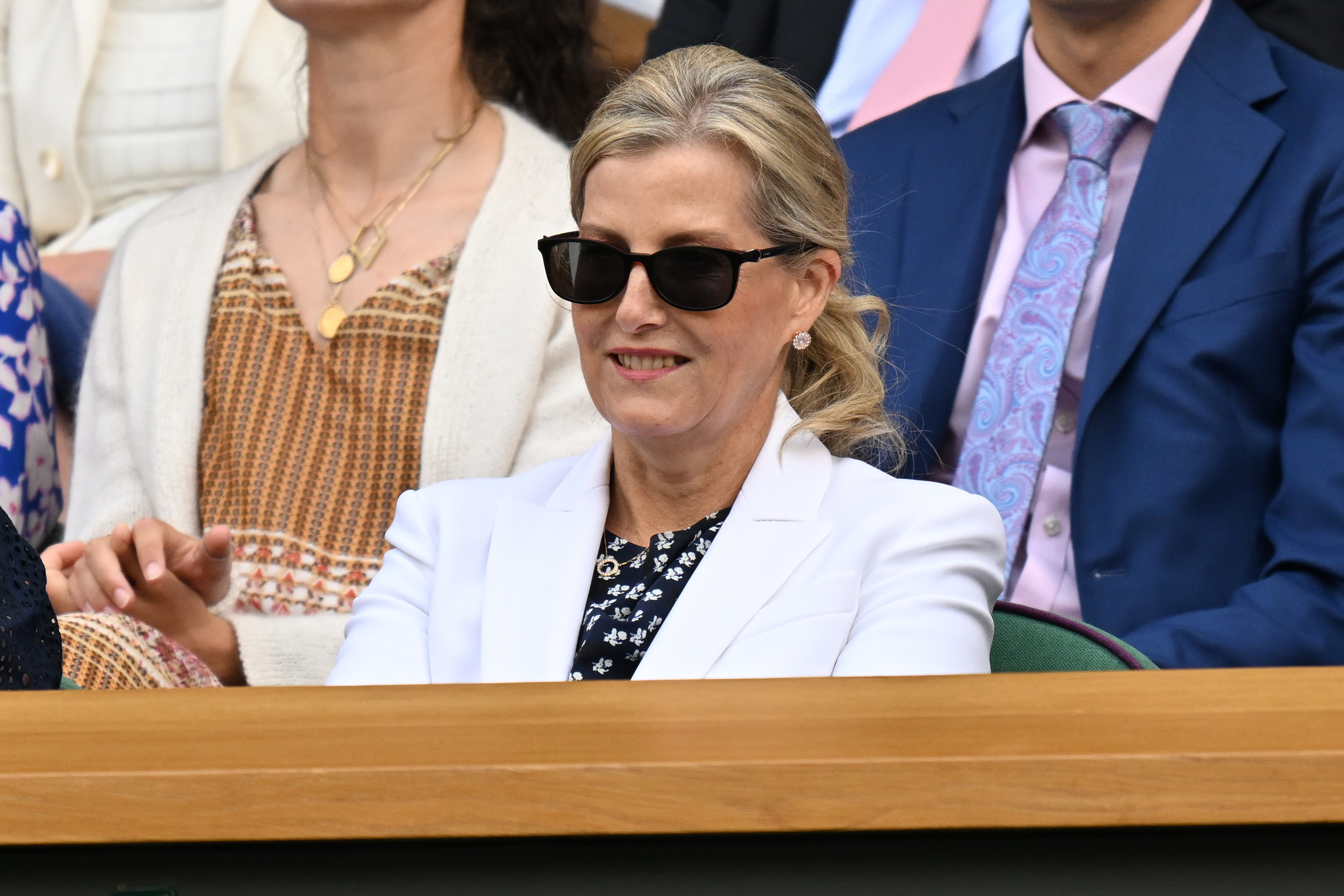 Duchess Sophie wearing sunglasses and a white blazer
