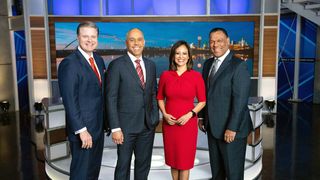 WFAA's late news crew includes (from l.): chief meteorologist Pete Delkus, anchors Chris Lawrence and Cynthia Izaguirre, and sports anchor Joe Trahan. 