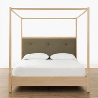 A wooden poster bed from McGee & Co.